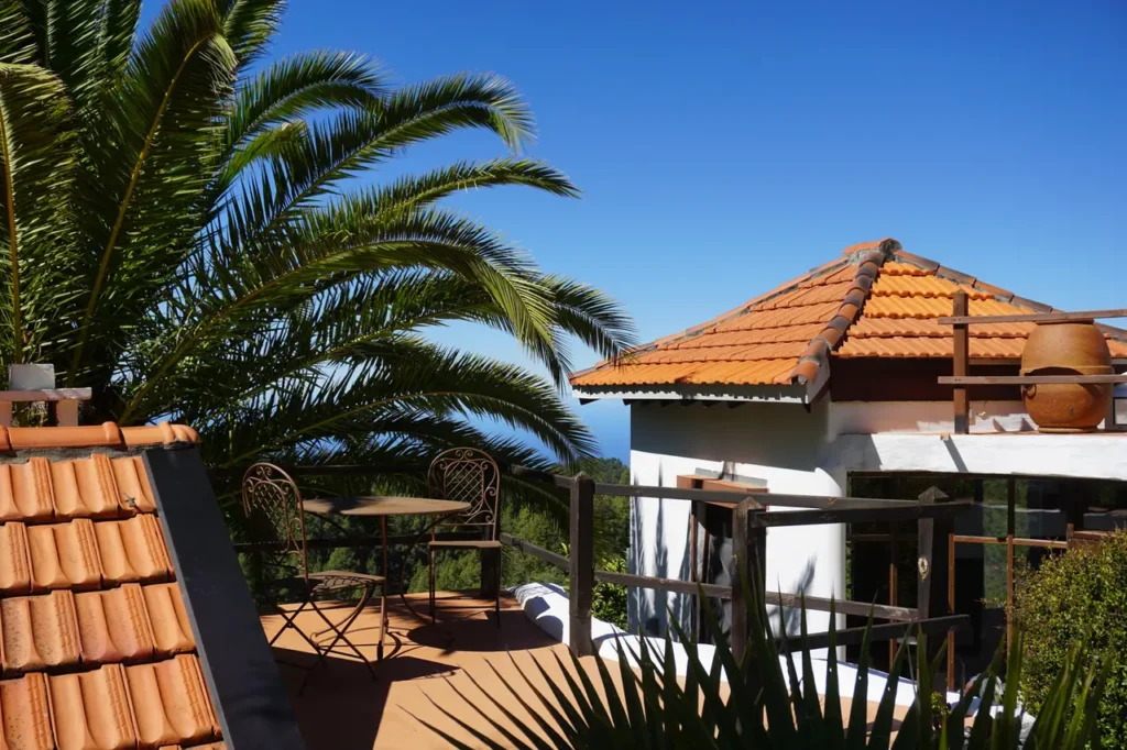 Ferienhaus El Refugio: Morgensonne und Palmen auf der Dachterrasse vom Studio auf der Hacienda La Palma
